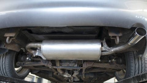 A picture of the rear underside of the car showing a brand new muffler.